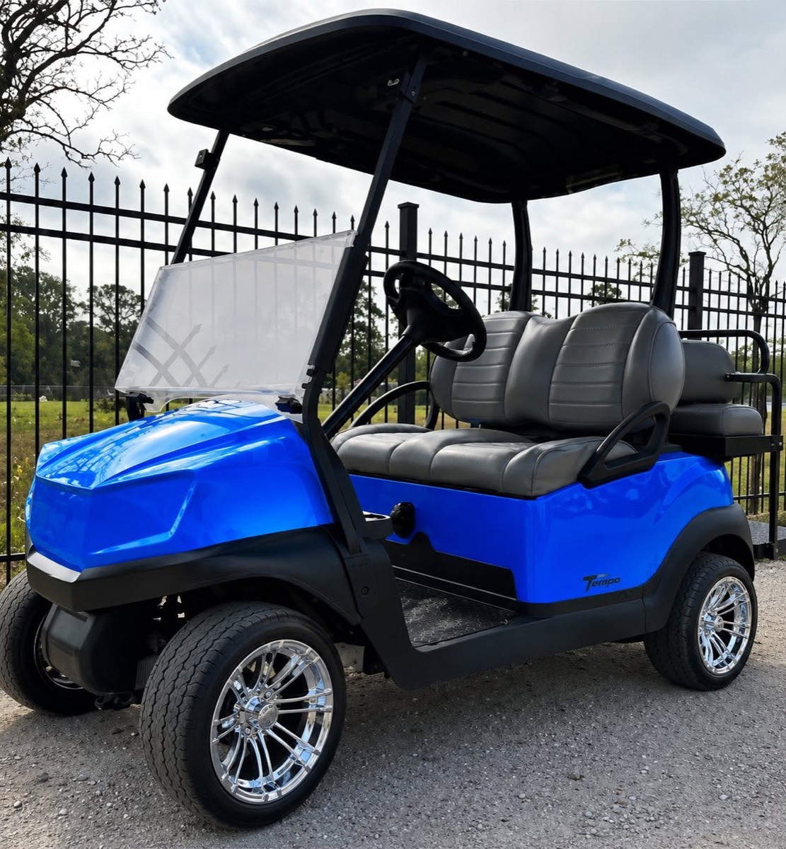 Blue Club Car Tempo with chrome wheels
